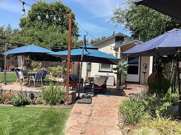 Front of the cottage with patio set up