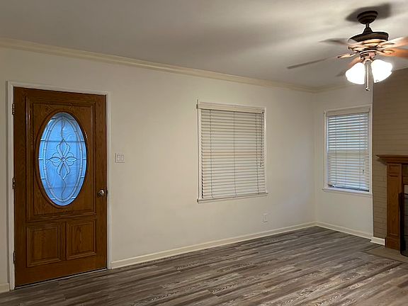 FRONT DOOR AND PART LIVING ROOM