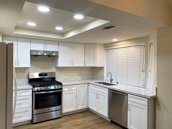Kitchen has lots of lights