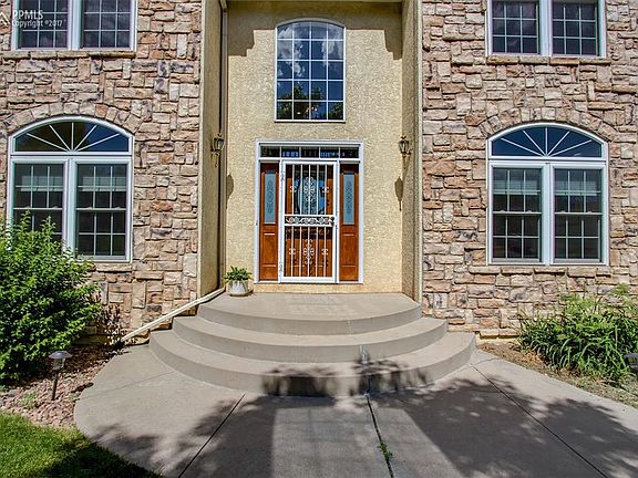Beautiful stucco and stone greet you as you enter your home!