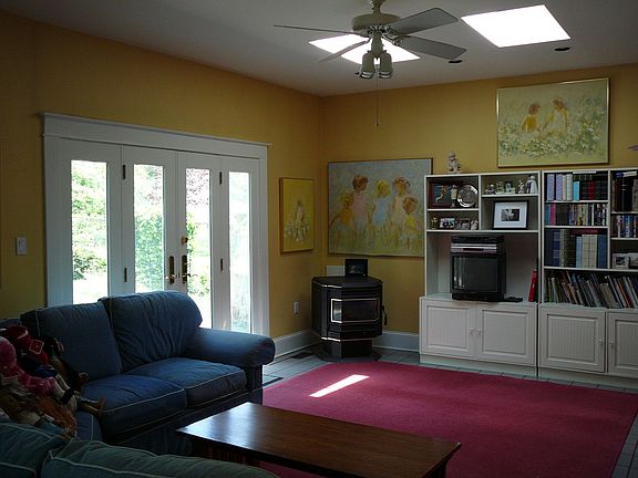 Family Rm w/Pellet Stove, Atrium doors out to Stone Patio