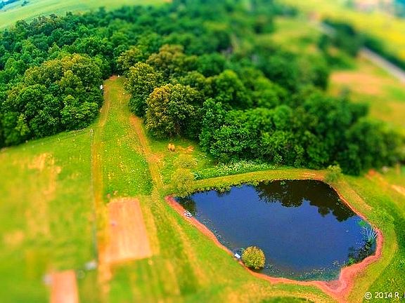 arial view of land and pond