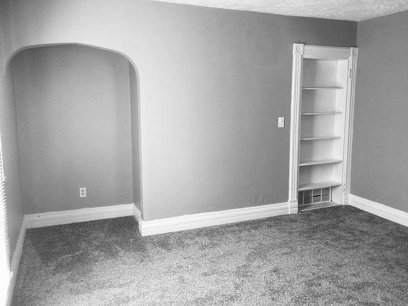 Family room area is good sized with charm of an older home and lots of light.