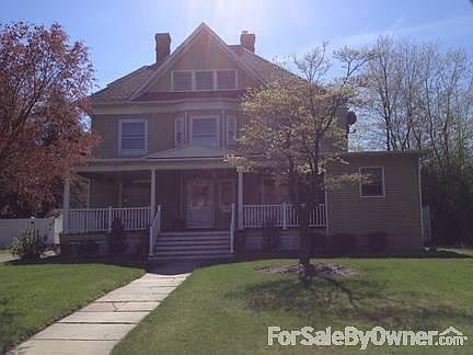 This Could Be Your New Home!
						:
						Gorgous and welcoming front porch - wicker furniture included!