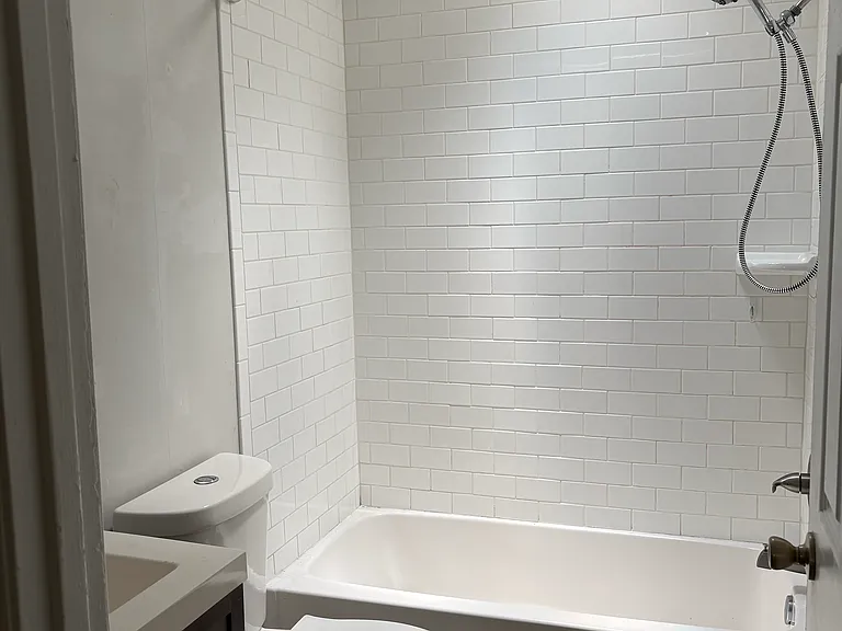 bathroom includes natural light from a suntube skylight