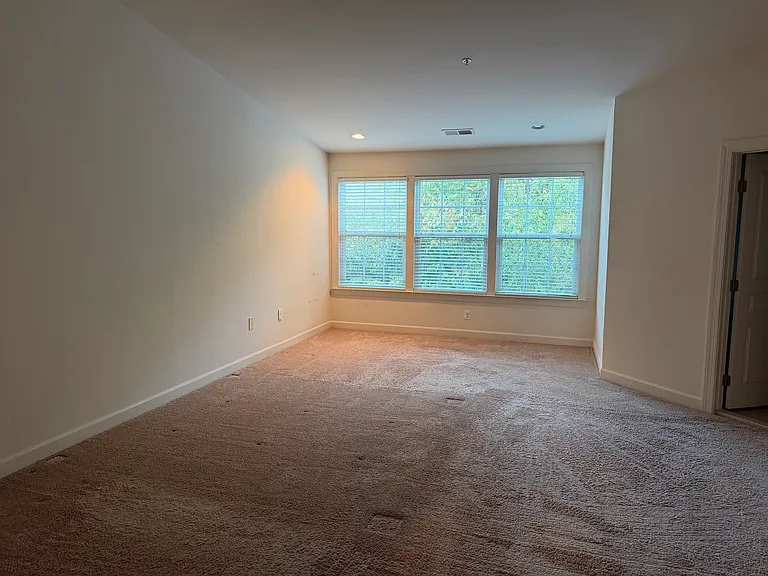 Master Bedroom with sitting area. Windows facing east for morning Sun