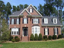 Stately brick style home on 6th hole of Crooked Creek Golf Course
