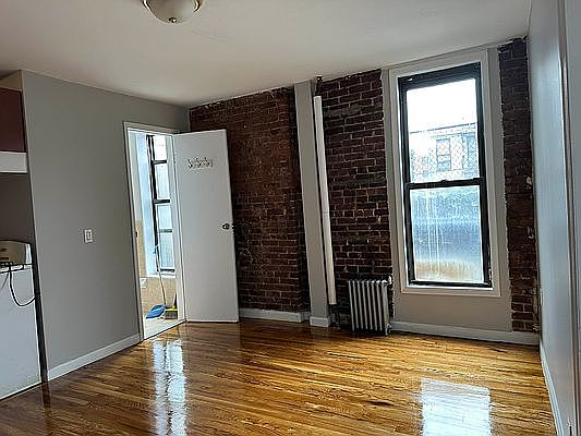 1st image of 411 E 114th St APT 16