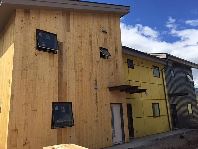 Grey unit on right - this image taken during construction... now property has nice landscaping with fruit trees.