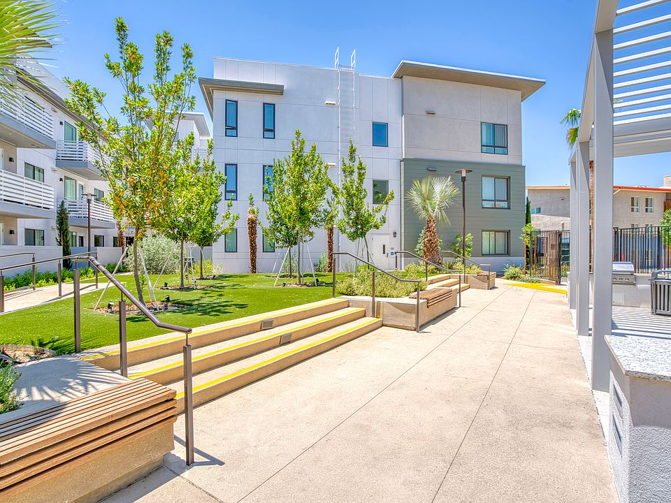 Campus-style community with open walkways and thoughtfully designed green spaces.