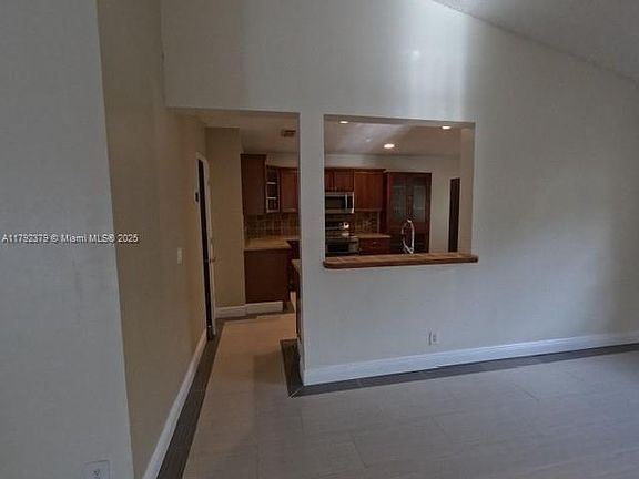 5th image of 10557 NW 10th Ct