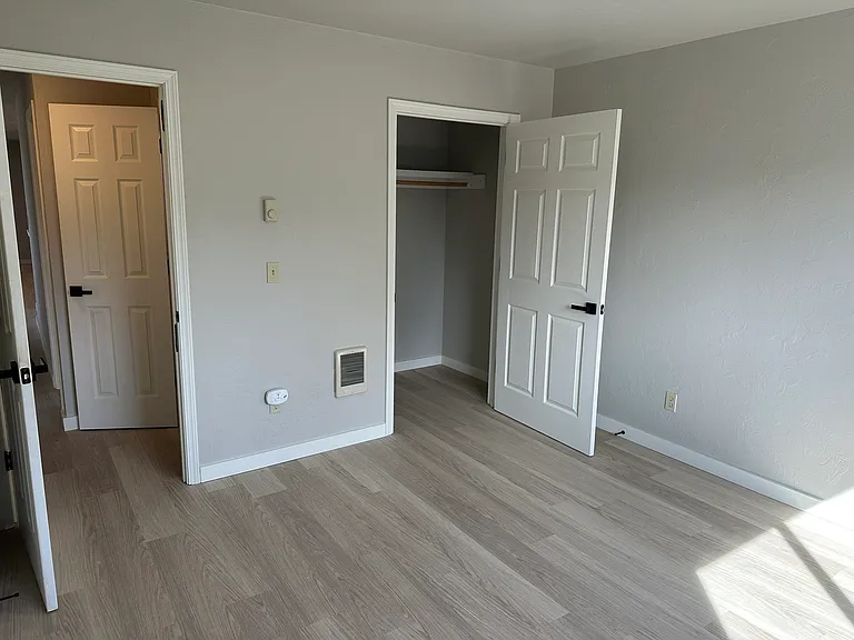 Bedroom #3 entrance, closet and Heating
