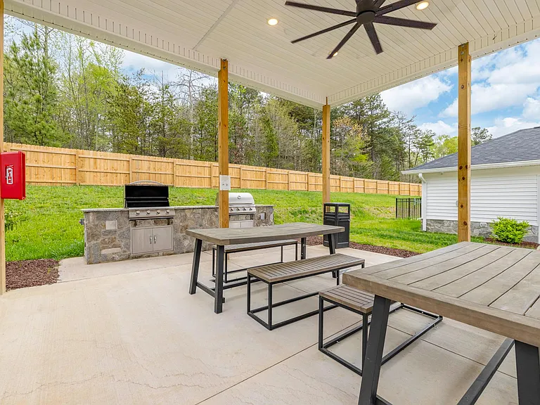 Cover Pavilion with picnic seating and gas grills at Legacy at Baldwin Ridge in Burlington, NC