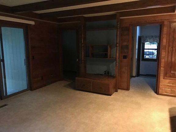 family room looking at hall 
to garage and basement on right.