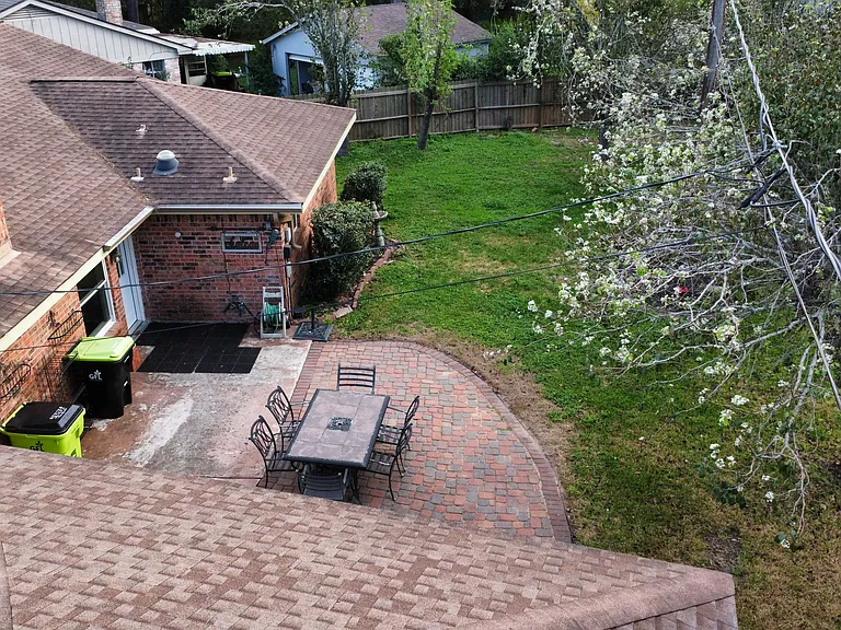 View of backyard from above garage.