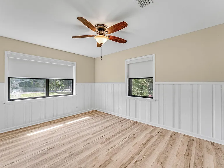 Bedroom 1. New black-out shades throughout the home. Great for shift workers.