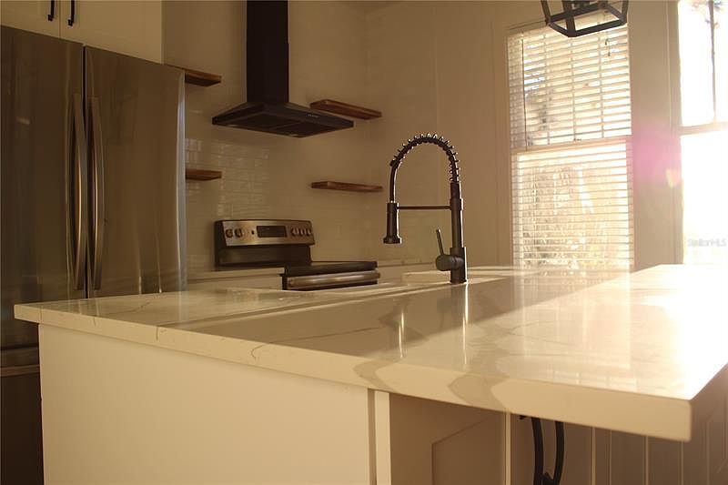 1st image of 1003 E 24th Ave APT A