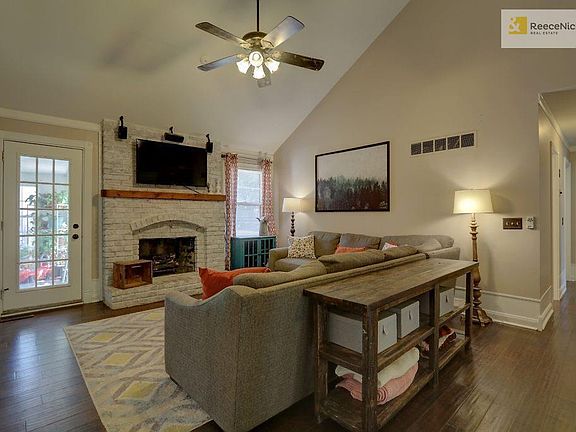 Main living area,  the door goes to the enclosed sunroom.