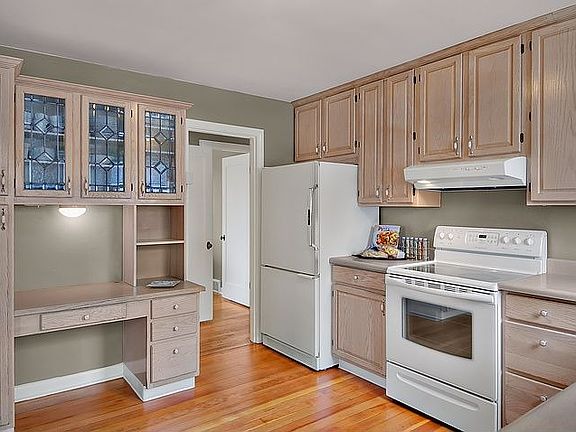 Spacious kitchen with fir floors. All appliances stay