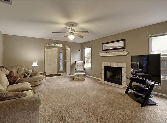 Spacious family room is the perfect place to gather friends and family.