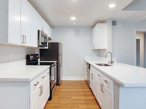 Updated kitchens with premium finishes are available for upgrade.