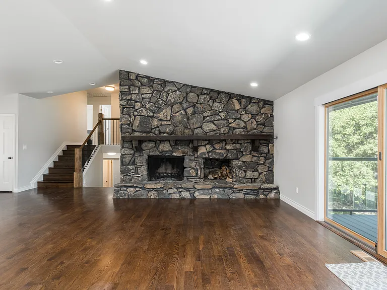 wood burning fireplace - original moss rock fireplace