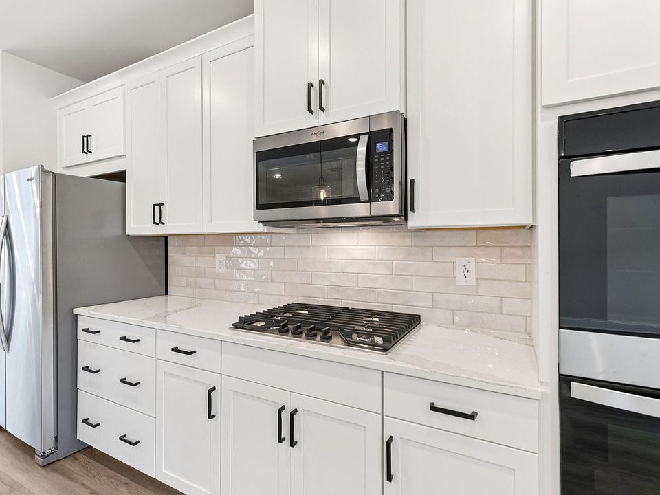 The Ashland floorplan with the Upscale Rustic Linen interior package.