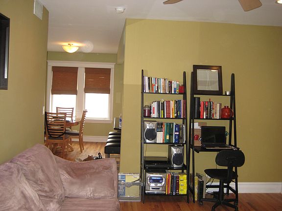 Living room open to dining and kitchen