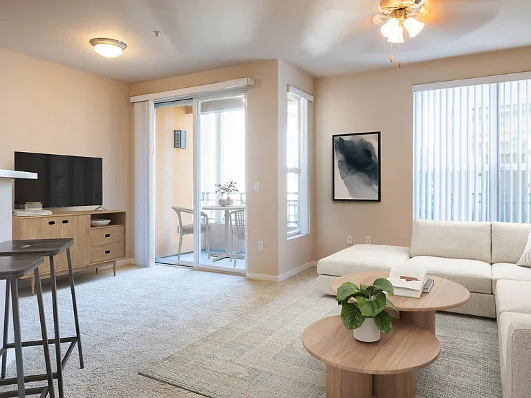Carpeted Bedroom with Balcony