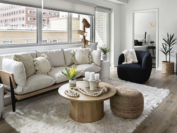 Apartment Living Room with wood floors.