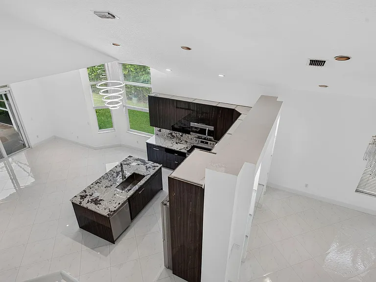 7087 NW 78th Pl — Photo 42