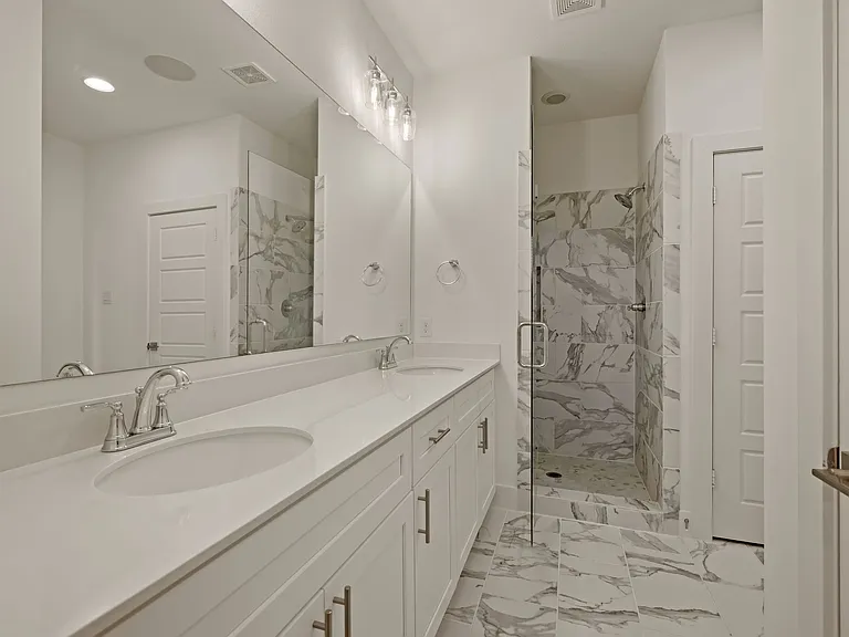 Master bedroom en suite master full bathroom with walk-in closet