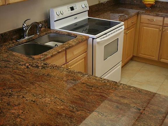 Granite counters and new cabinets make this kitchen a dream to work in