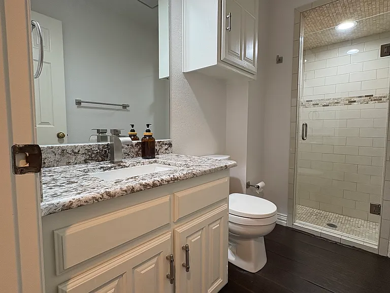 DOWN STAIRS FULL BATHROOM