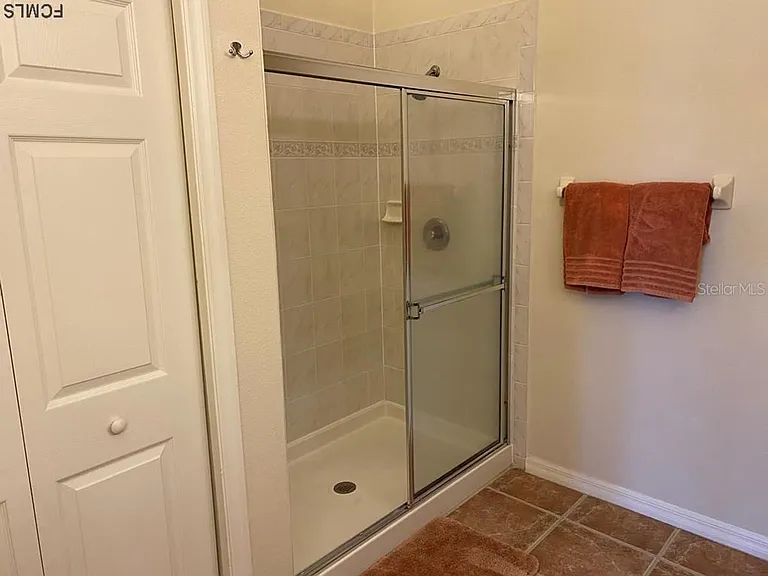 Primary bathroom walk-in shower.