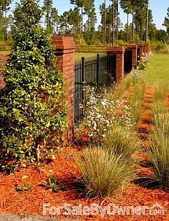 Landscaped
						:
						Muhly grass and spirea; also known as bridal wreath.