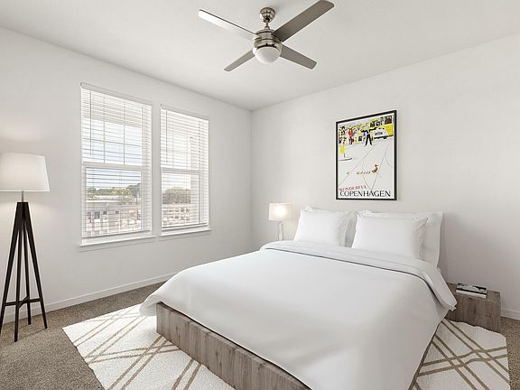 Experience tranquility and style in this beautifully designed bedroom retreat.