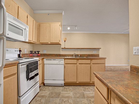 Built in Desk and White Appliances