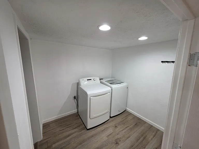 Laundry room with washer and dryer included