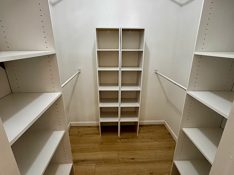 Walk-in closet in master bedroom