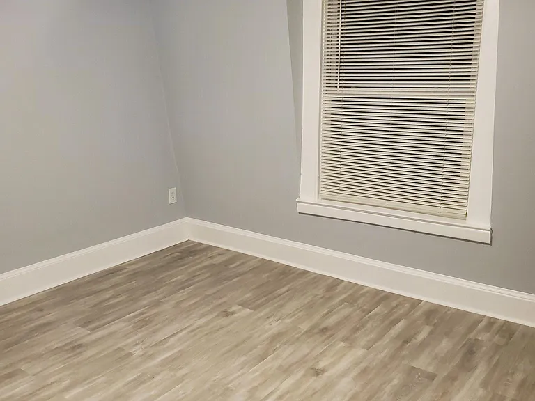 All bedrooms have a beautiful light gray laminate flooring, new.