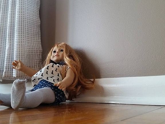 Shows curtains, paint color and floor quality