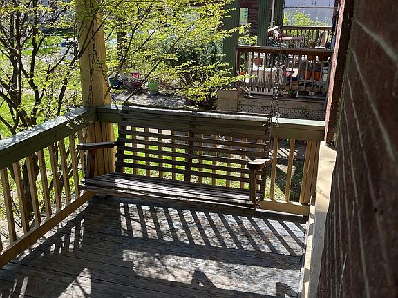 Front porch swing. Landscaping by owner
