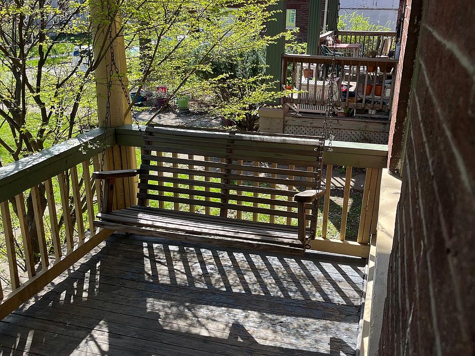 Front porch swing. Landscaping by owner