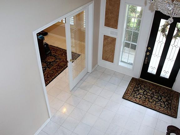 This view gives you a quick peek into the large Study which features French doors.