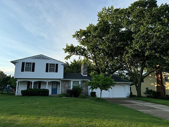Front of the house, two cars garage.