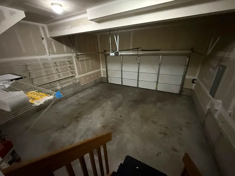 2-Car Garage: Attached 2-car garage with additional storage space.