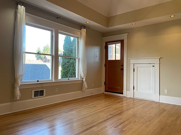 Living room, Balcony Door, and small Storage Space.
