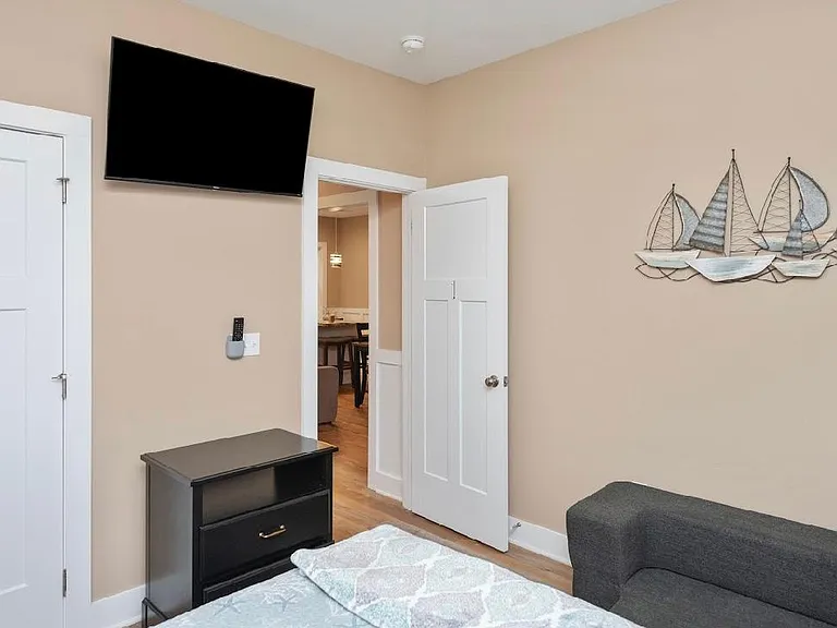 2nd bedroom with own TV and a closet