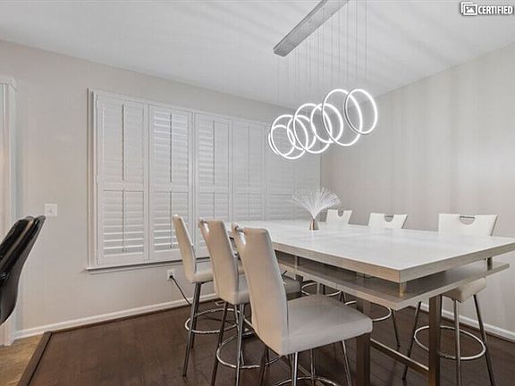Large double decker table with cubby space and outlets.